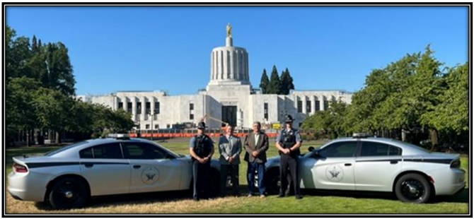 Rep. Lewis and Rep. Helfrich photo with OSP