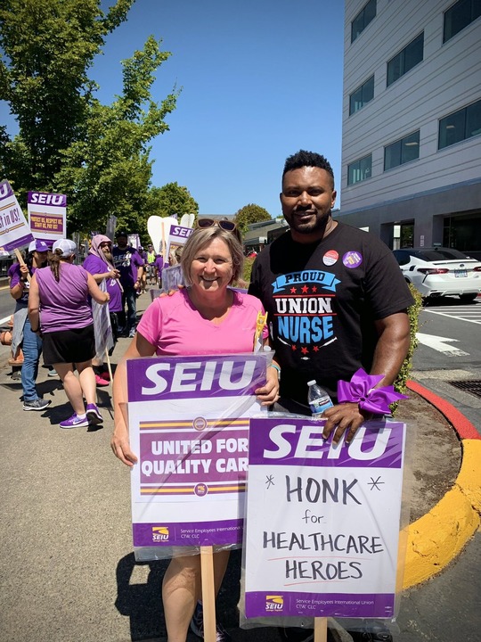 rep nelson with workers at SEIU picket line