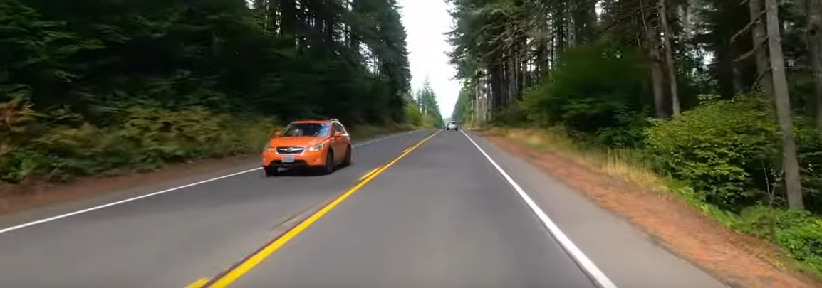 orange car on road