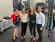 Rep. Chaichi, Rep Sosa, Rep. Reynolds and Rep. Graber stand in a gym