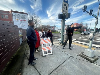 Rep Nelson with former electeds and Albina Vision Trust staff at intersection above I-5