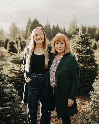 Emily and Susan McLain getting a christmas tree 