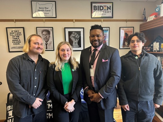 Rep Nelson with two students and one organizer in his office.