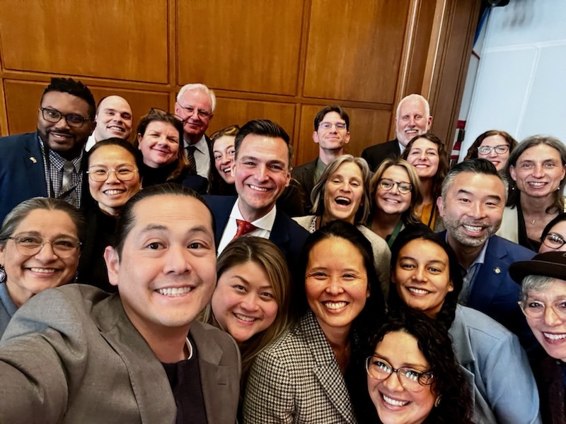 Representative Nelson poses with other Representatives. 