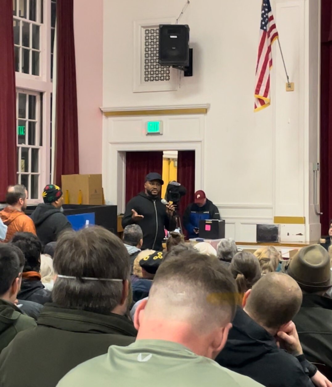 Rep Nelson speaking in front of a large crows at the St. Johns Neighborhood Association about the bottle drop