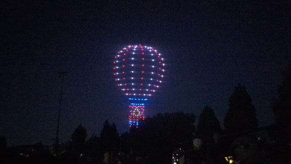 Drones over Tigard High School light up the night sky on July 4th in the shape of a hot air balloon