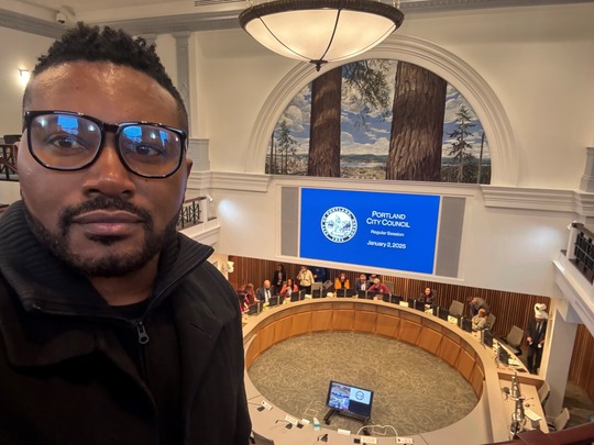 Rep. Nelson stands in front of city council meeting