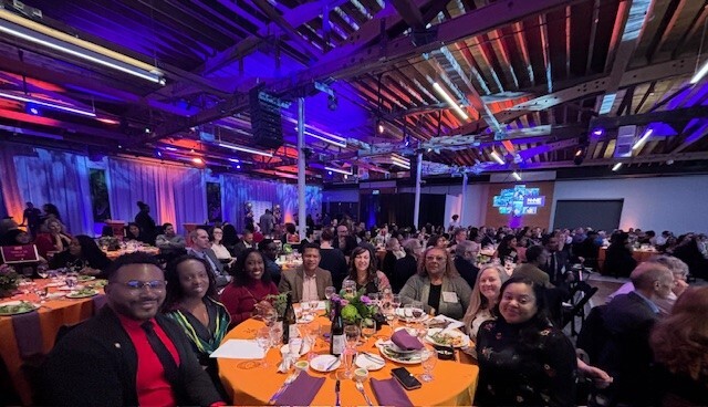 Rep Nelson sits with a table