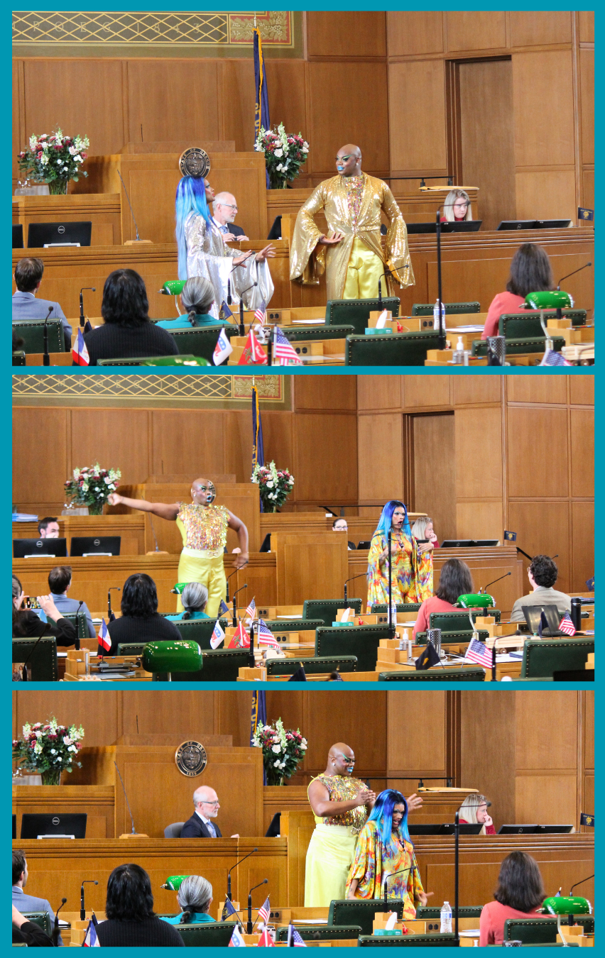 Two Drag Queens performing at the front of the House of Representatives
