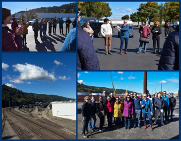 Legislators and staff around rail carrying fuel