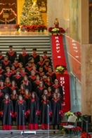 choir performing on rotunda stairs