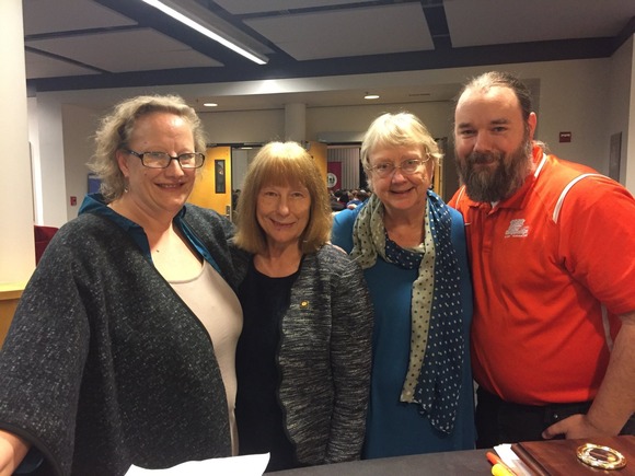 McLain with debate coaches in the region
