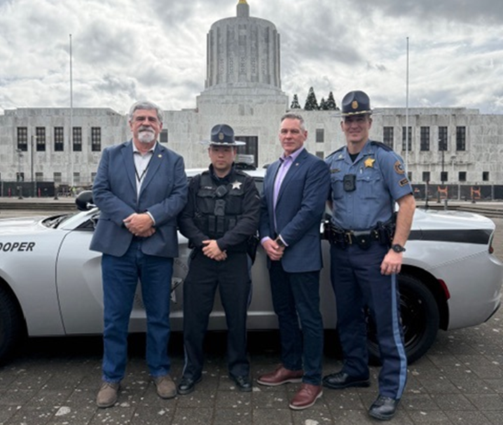 Lewis and Helfrich with OSP Troopers at Capitol
