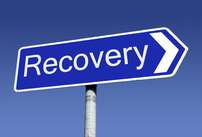 Photo of sign that says "recovery"