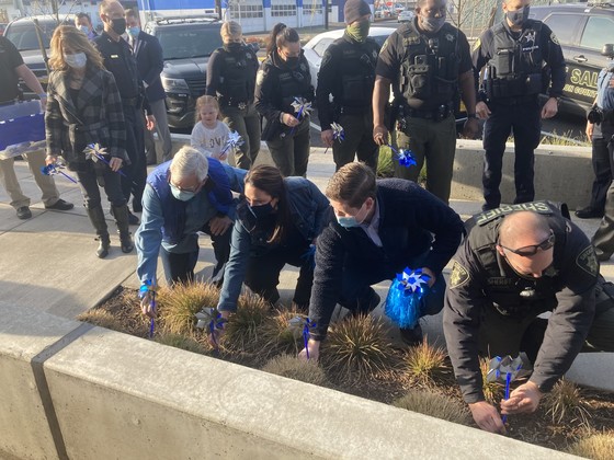 Commissioners plant pinwheels in support of Child Abuse Prevention Month