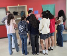 Image of the Mt Angel TAB Students passing out resources and talking to other students 