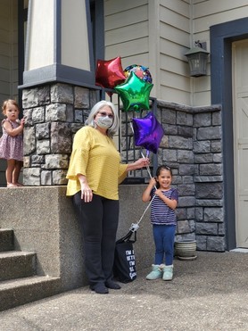 Marisol Jimenez receives her retirement blanket