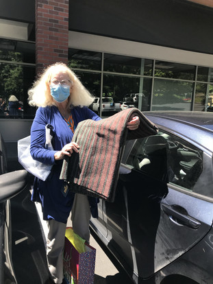 Cindy Souza receives retirement blanket