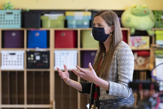 Megan McCarter stands in front of students in a classroom