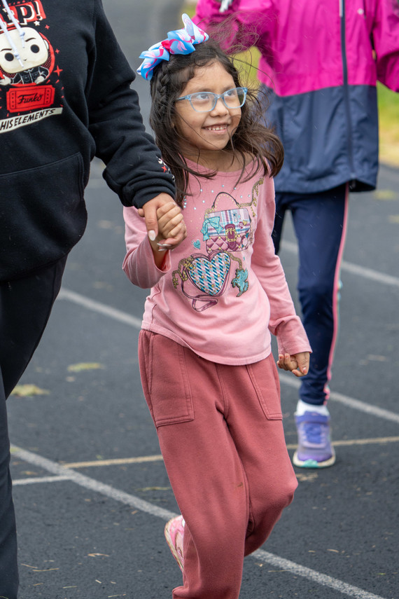 Leslie, a kindergartener at Elmonica Elementary School in Beaverton, races in the 100-meter dash
