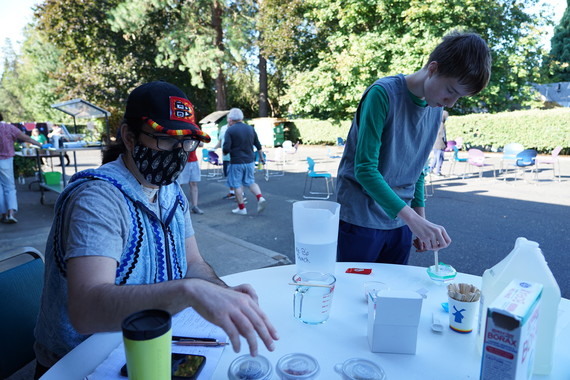 Jack Tallman mixes glue, water and borax to make slime