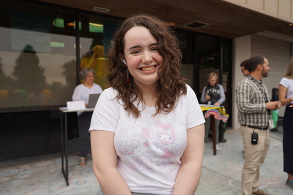 Hannah Freuf poses for a photo outside Pacific Academy