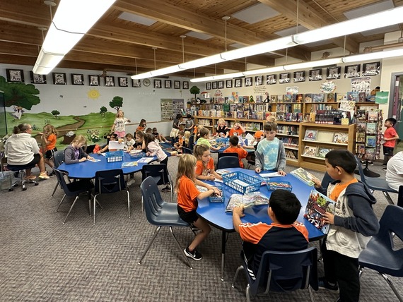 Students read books in the library