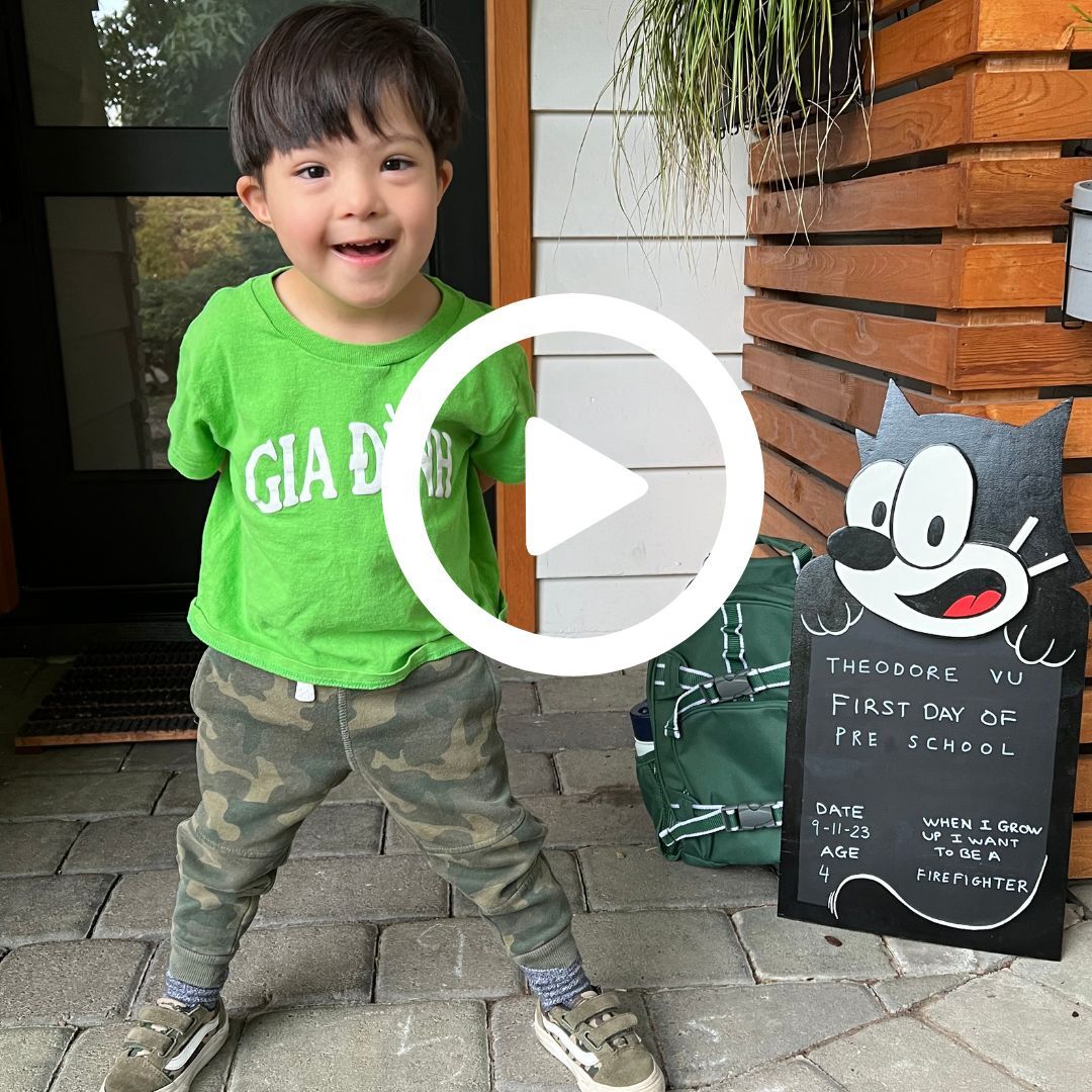 a preschooler poses for a photo on his first day of preschool