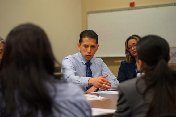 Rep. Nathan Sosa speaks with board members, students and staff from hillsboro school district