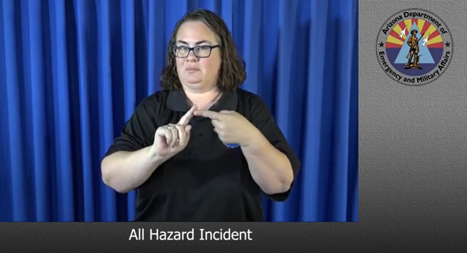Photo: Woman demonstrating American Sign Language Glossary