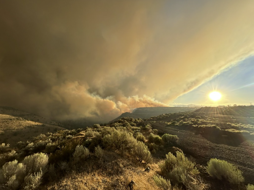 Wildfire smoke rolls over the skies near Warm Springs - A wildfire burns along U.S. 26 near Warm Springs on July 25, 2026 ODOT