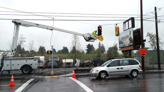 Removing bags from new Alderwood/Columbia signal