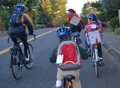 Students riding in a bike train to school. 