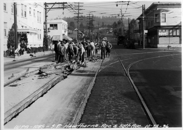 Crews work on the trolley tracks at SE Hawthorne and 50th in 1936