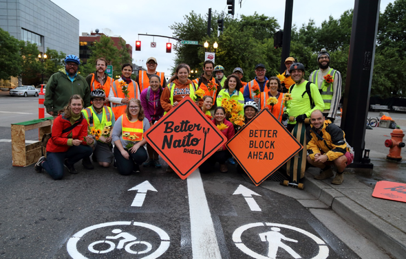 Better Block volunteers together in the newly installed Better Naito in 2015. Photo courtesy of Better Block PDX.