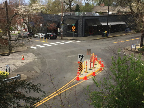 New crosswalk and wands on a traffic diverter near Ainsworth Elementary