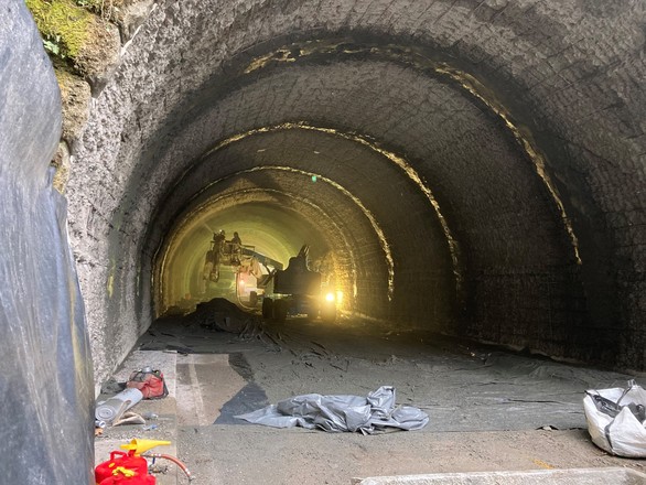 Photo of contractors installing shotcrete in one of the Cornell Tunnels 