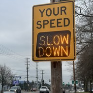 Slow Down speed reader 82nd Ave near McDaniel