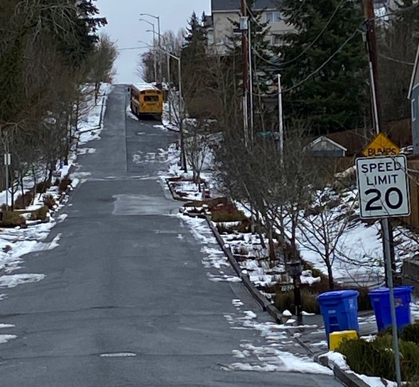 SE 152nd Avenue near SE Barbara Welch Road is clear and open, but a school bus remains stuck in the road.