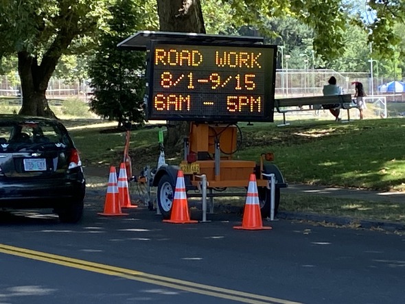 Electronic Message Sign for NE 33rd Avenue says road work coming Aug 1 to Sept 15
