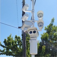 A speed safety camera mounted to a pole on a high crash corridor