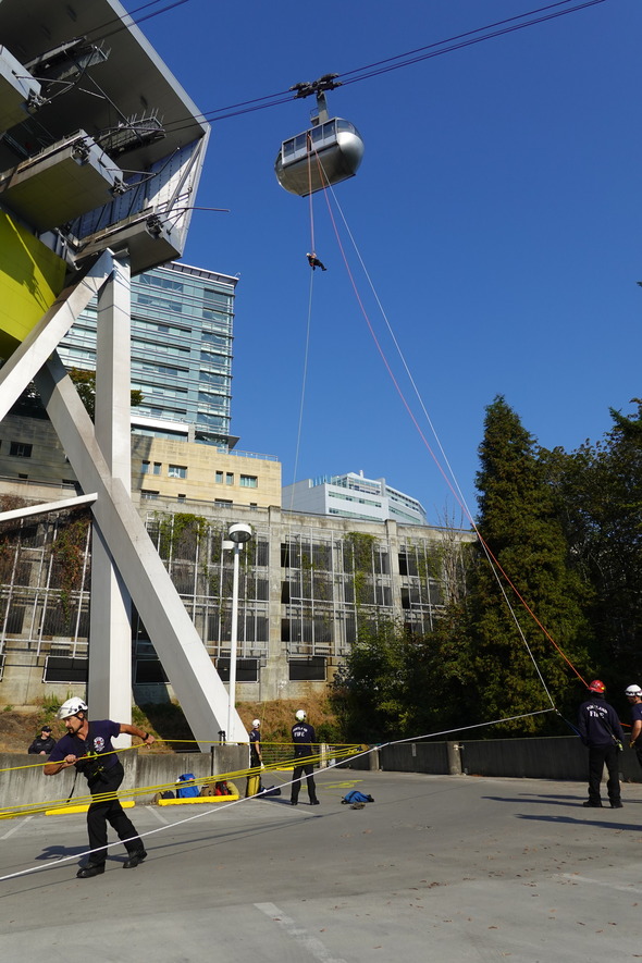 Tram evacuation drill conducted by Portland firefighters on parking garage at OHSU