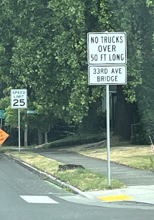 This image shows a sign that PBOT crews posted today, saying "No trucks over 50 feet long"
