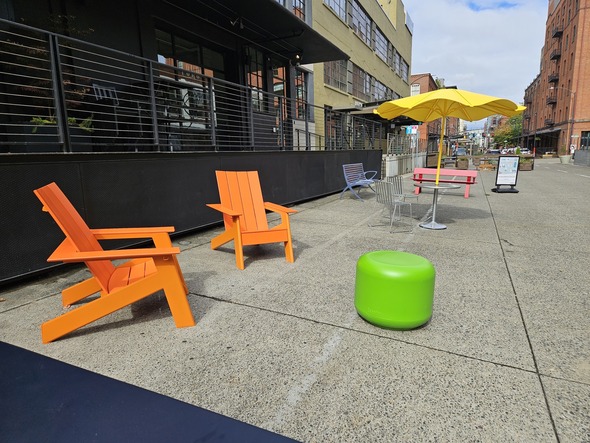 Various colorful outdoor plaza furniture lines NW 13th Plaza for the Lounge Lab test site.