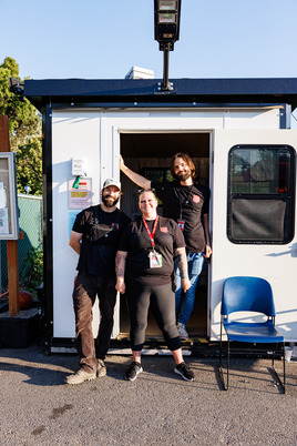 Staff at Sunderland RV Park in front of their office.