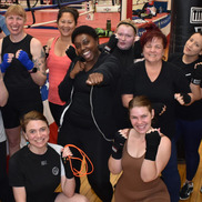 Parks & Recreation boxing class with diverse women