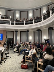 Guests attend the first evening City Council meeting