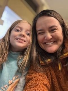 Picture of TKL with Sintra during a visit to my school