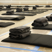 Emergency shelter inflatable mattress and blanket