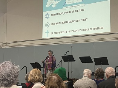A panelist speaks at the Jobs with Justice Faith and Labor Breakfast.